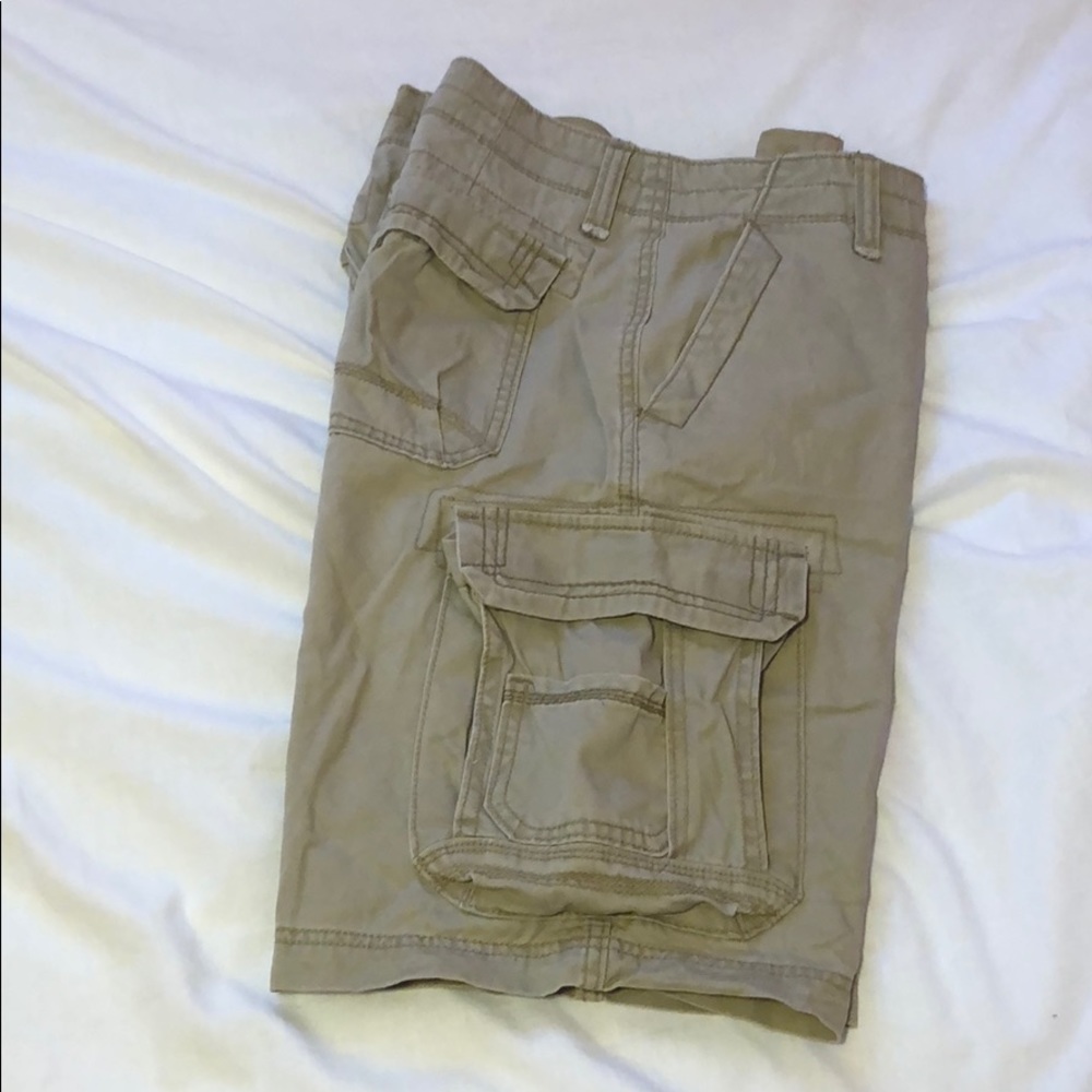 Young men’s khaki cargo shorts.